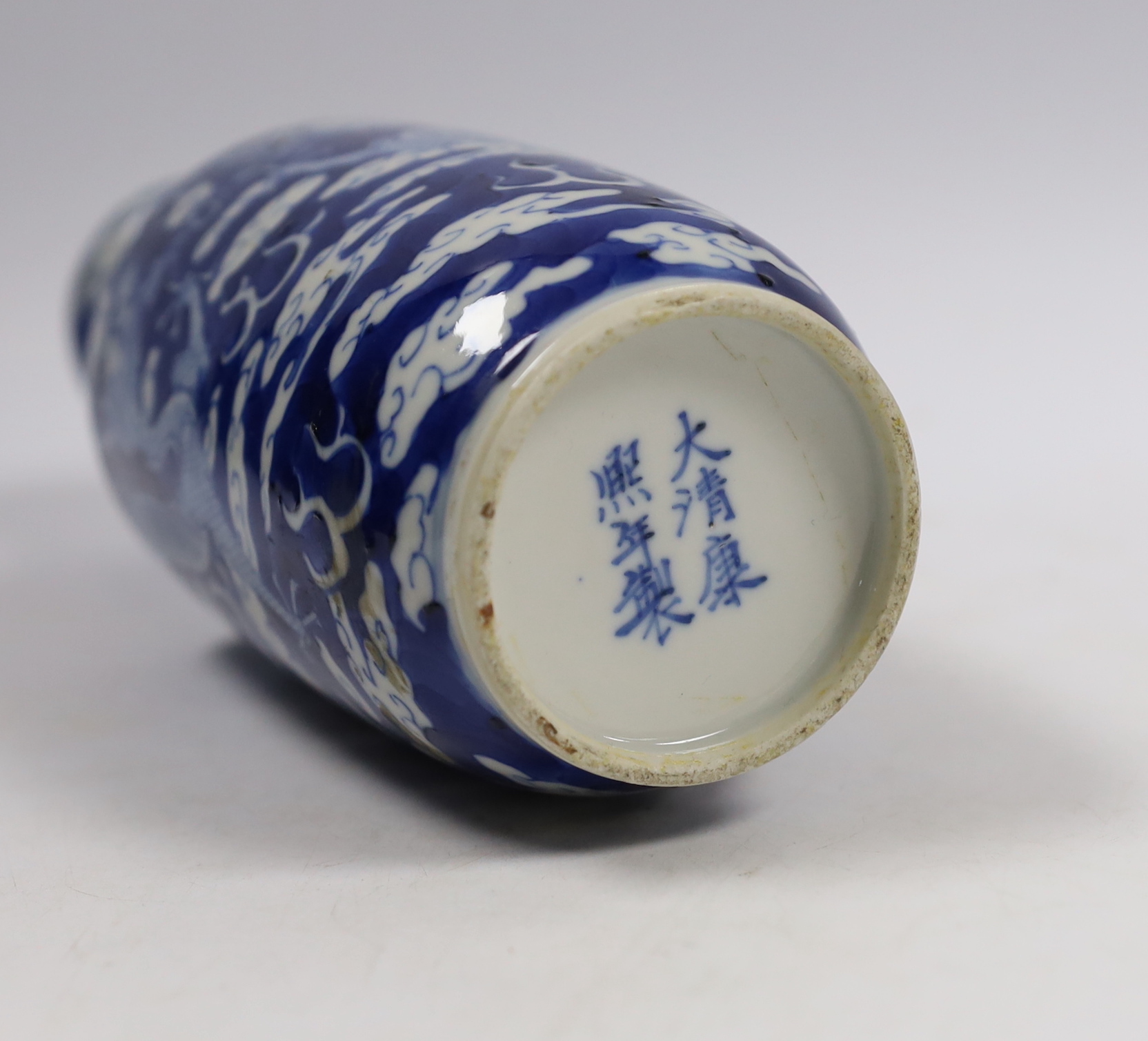 A Chinese blue white ‘dragon’ rouleau vase, Kangxi mark, late 19th century, 21cm high